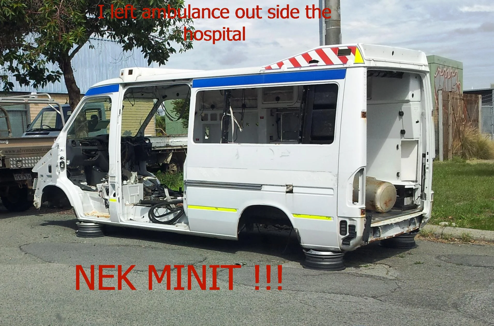 Nek Minnit — Stripped ambulance with missing wheels in a lot captioned I left ambulance outside the hospital Nek Minit
