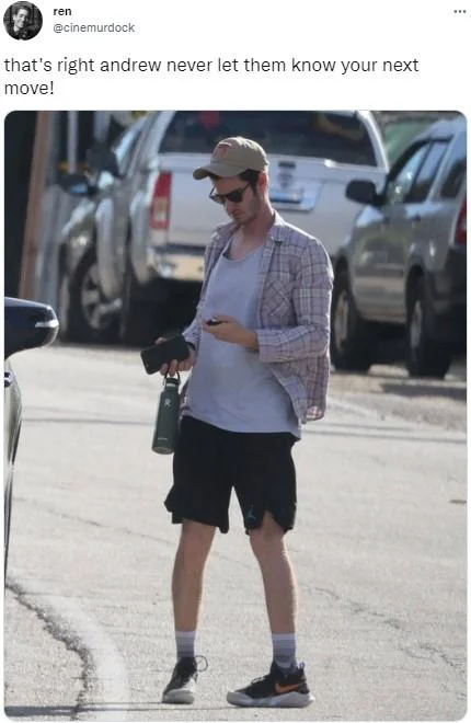 Tweet about Andrew Garfield's casual street outfit captioned 'never let them know your next move'