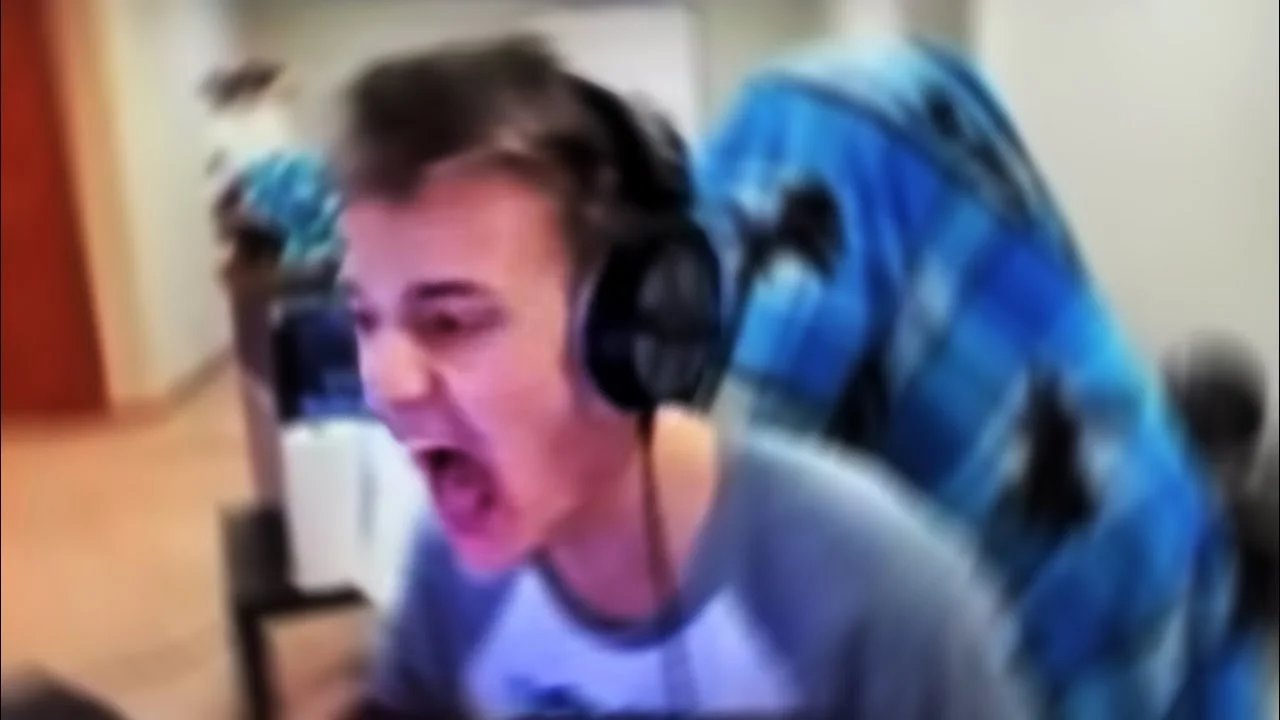 Ninja's "It's Just A Game" Tweet — Ninja screaming with headset on during a livestream
