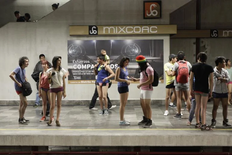 No Pants Subway Ride — Group of pantsless participants at Mixcoac subway station in Mexico City