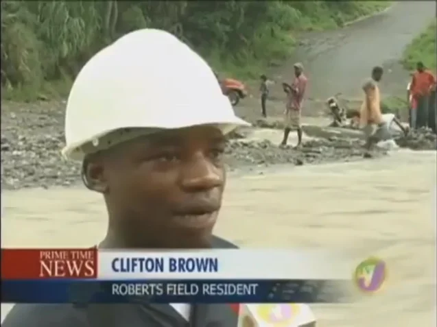 Nobody Canna Cross It — News interview screenshot of Clifton Brown in a white hardhat labeled Roberts Field Resident on Prime Time News.