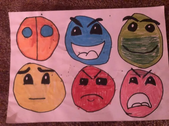 Normal Difficulty Face Drawing Geometry Dash — Photograph of six hand-drawn Geometry Dash difficulty faces on pink paper with poorly drawn green Normal face