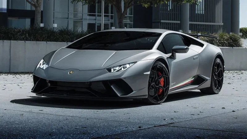 Not a Lambo — Matte gray Lamborghini Huracan Performante parked in front of a building