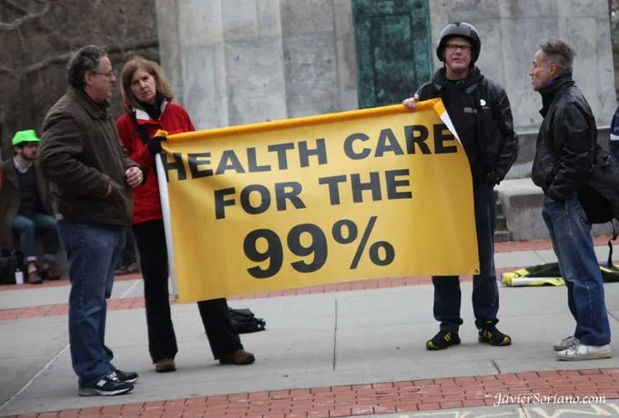 Obamacare — Obama and advisors laughing with caption about telling people the ACA is not a tax