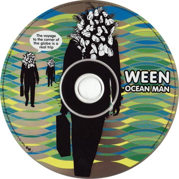 "Ocean Man" by Ween — Ween Ocean Man CD single artwork with abstract figure and wavy ocean pattern