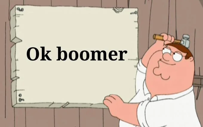 Family Guy Peter Griffin holding blank poster board with OK boomer written on it.
