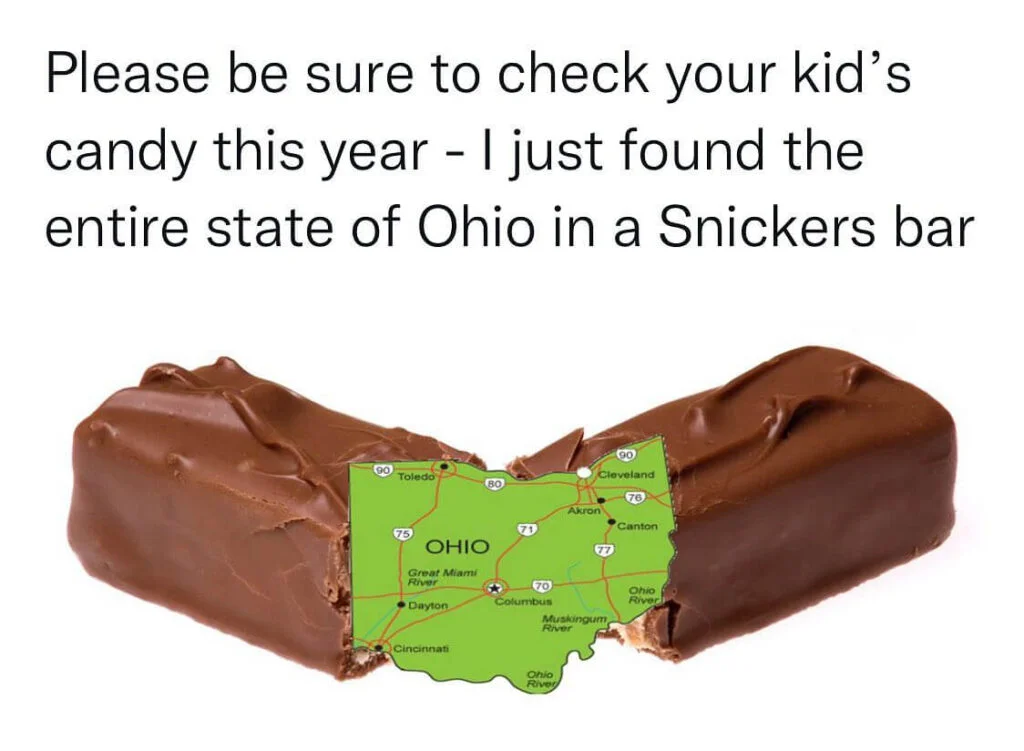 Only in Ohio — Broken Snickers bar revealing Ohio state map inside with unusual candy warning text.