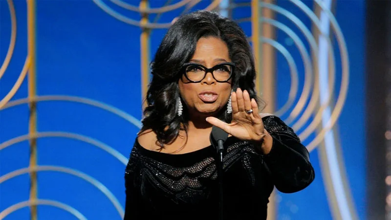 Oprah 2020 — Oprah Winfrey speaking on stage at the 2018 Golden Globes