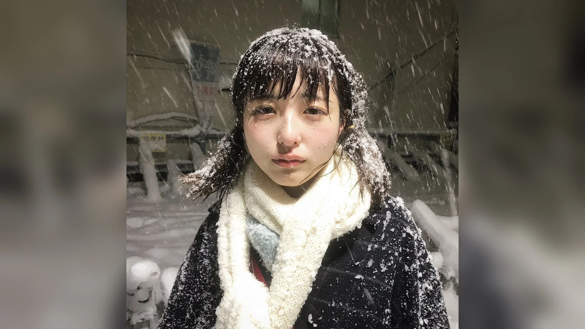 Ouhhh... Husbant... Now We Are Homeress... — Young Japanese woman covered in snow during a nighttime blizzard, wearing a white scarf and dark coat with a sad