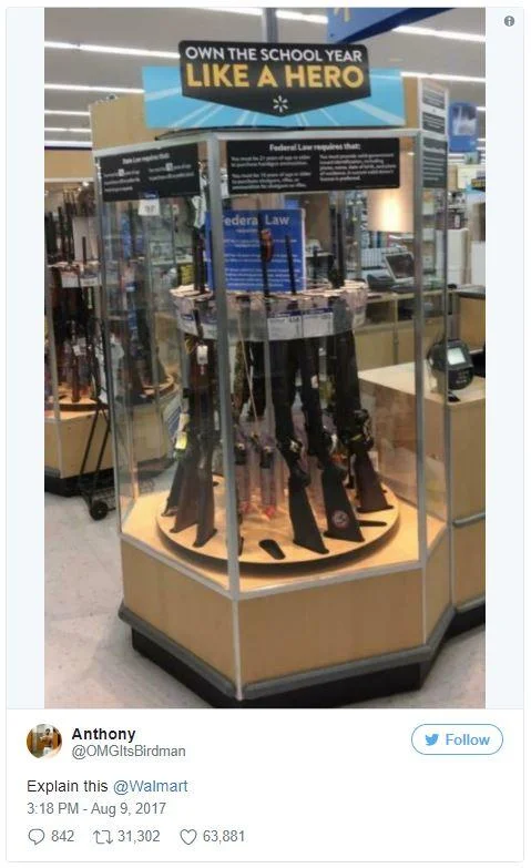 A Twitter screenshot showing the Walmart 'Own the School Year Like a Hero' sign above retail merchandise from August 2017.