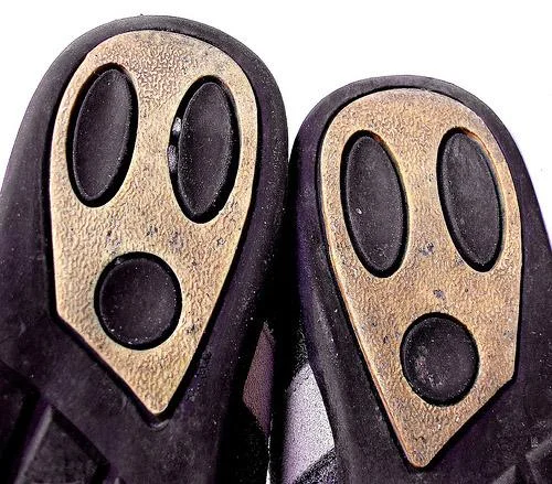 Pareidolia — Shoe soles with rubber patches resembling ghostly screaming faces