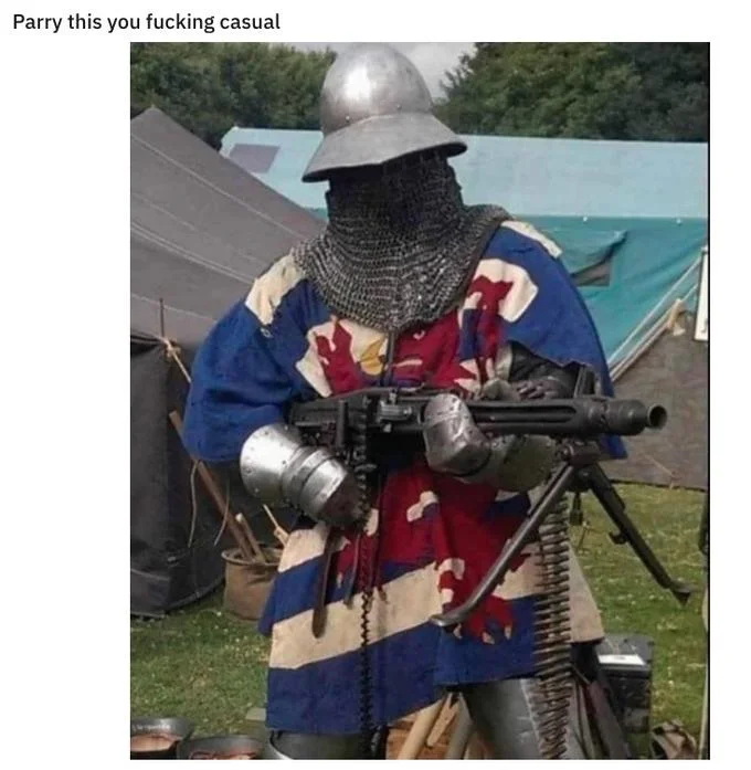 Parry This You Filthy Casual — Medieval reenactor in chainmail firing a mounted machine gun, captioned 'Parry this you fucking casual'