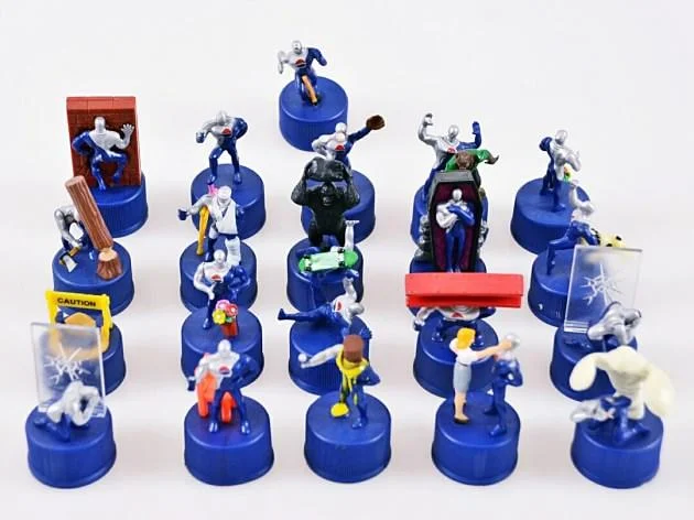 Collection of Pepsiman and other character bottle cap figurines