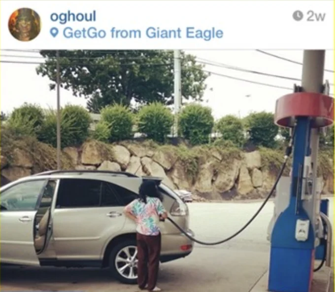 Perpendicular Fueling — Instagram screenshot of a person fueling a silver SUV with the hose draped perpendicular across the roof.