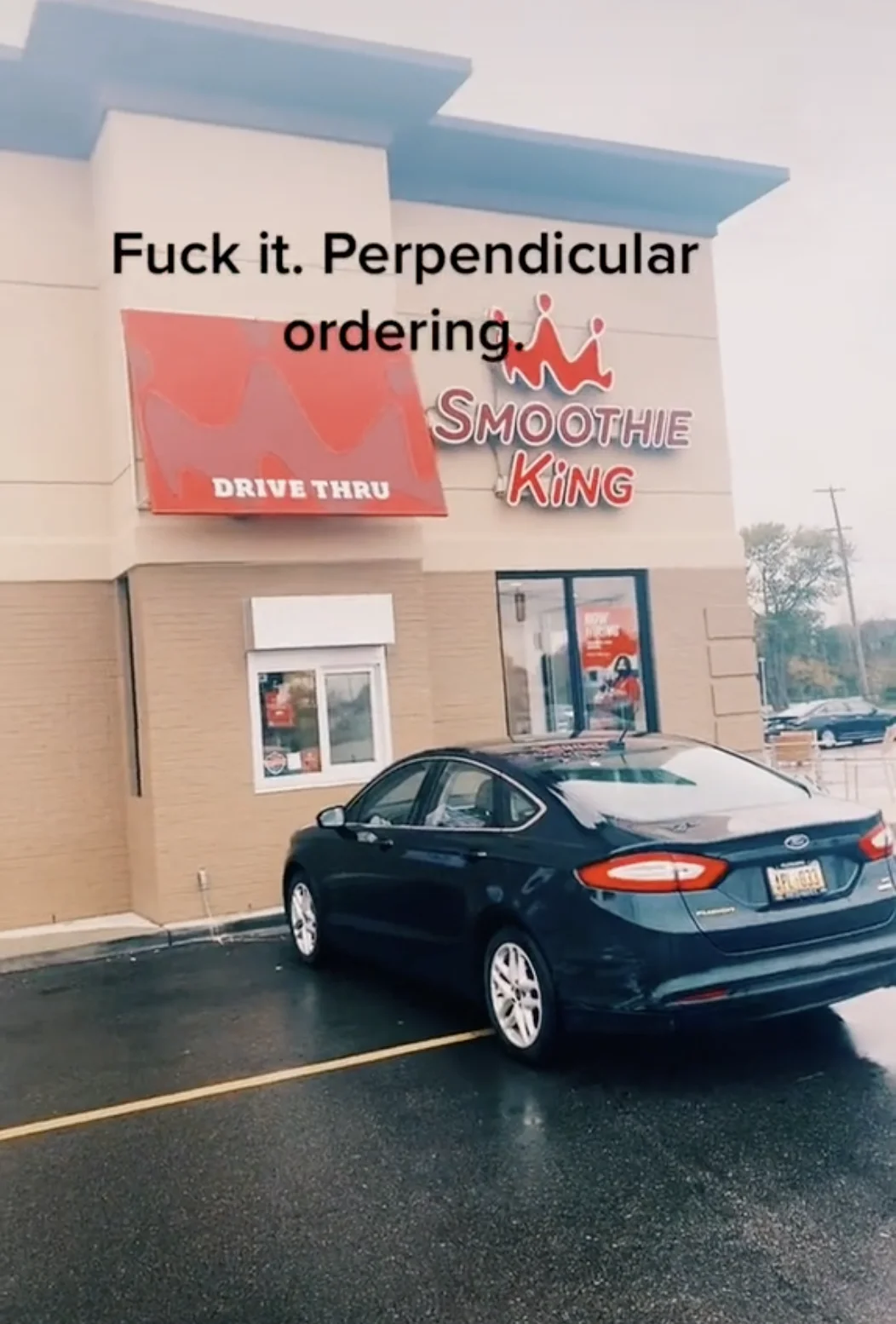Perpendicular Fueling — Dark Ford Fusion parked sideways at a Smoothie King drive-thru window with 'Perpendicular ordering' caption.