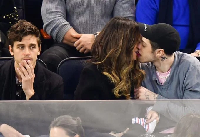 Pete Davidson Dating Up — Pete Davidson kissing Kate Beckinsale at a hockey game.