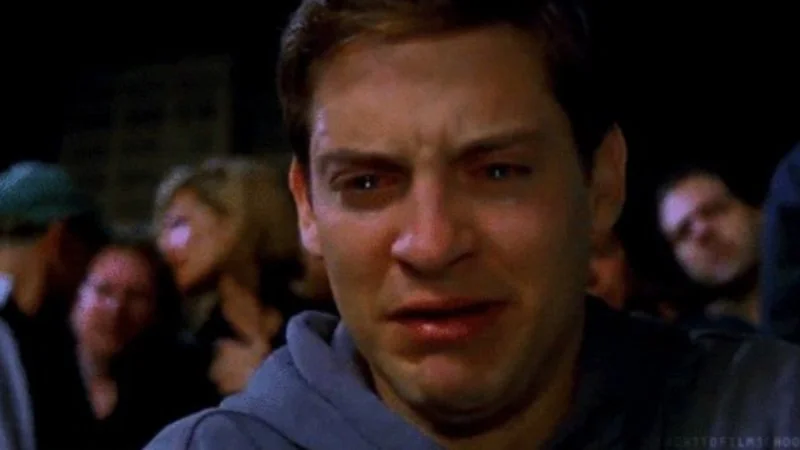 Peter Parker Crying — A well-framed close-up of Peter Parker's face displaying emotional distress with visible tears for immediate meme recognition.