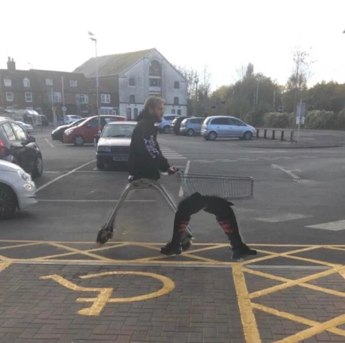 PewDiePie Has No Legs — PewDiePie pushing a shopping cart in a parking lot with oddly shaped legs