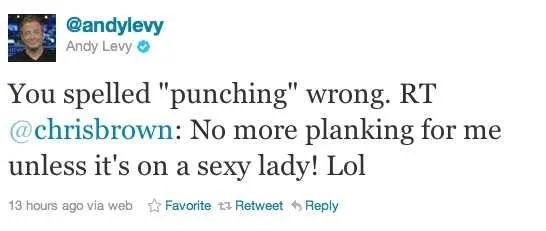 A Twitter post screenshot showing Andy Levy replying to Chris Brown's planking comment with a joking word choice correction.