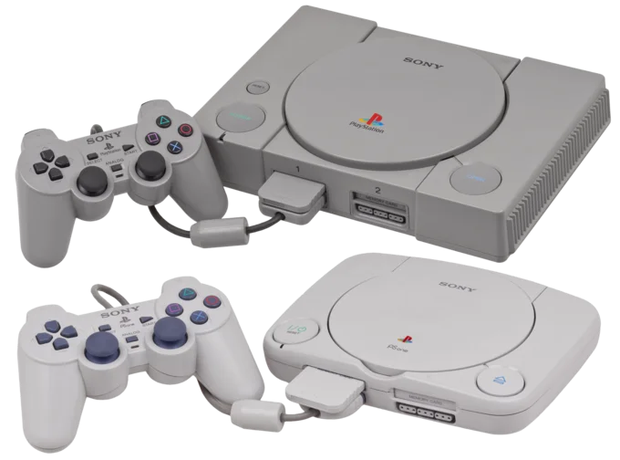 Original PlayStation console and PSone slim redesign with controllers