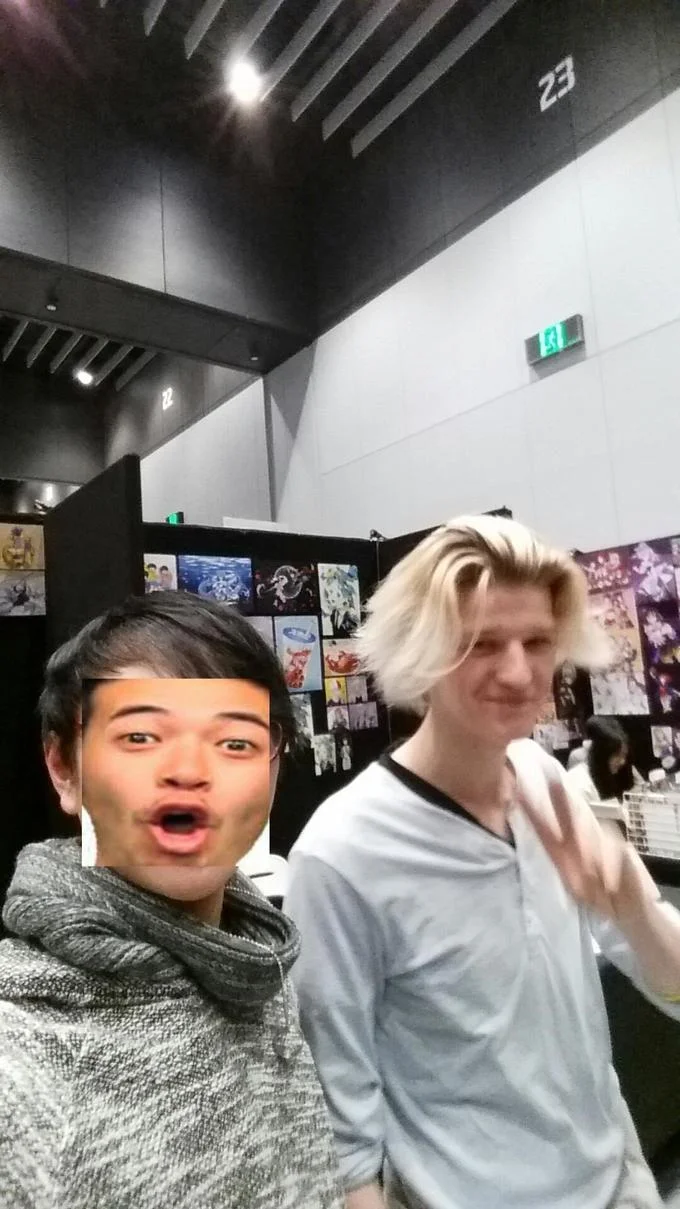 Convention photo with Pogu face pasted over a person's face