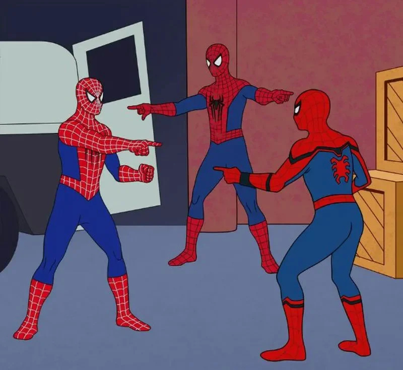 Pointing Spider-Man — Three Spider-Men pointing at one another including two from the 1967 animated series and one live-action version in a warehouse setting.
