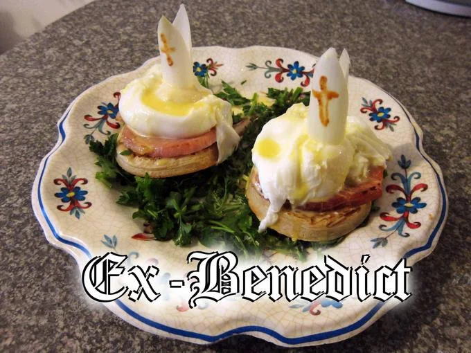 Pope Benedict XVI's Resignation — Eggs Benedict dish with papal mitres labeled 'Ex-Benedict'