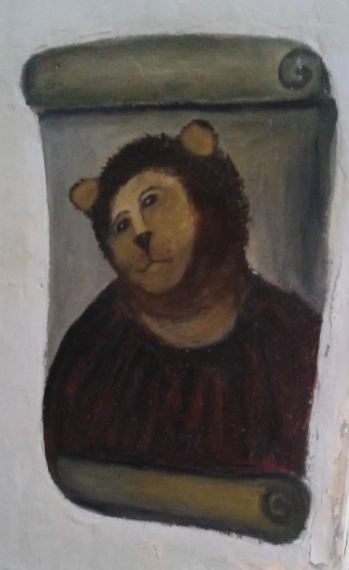 A photoshop edit placing an anthropomorphic cartoon bear face onto the Potato Jesus fresco in its original frame.