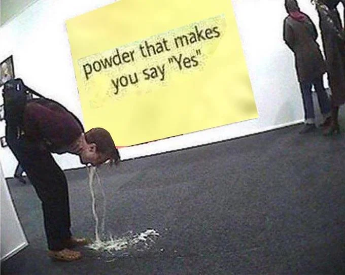 Powder That Makes You Say "Yes" — Person vomiting in a gallery with the powder that makes you say Yes label on the wall.