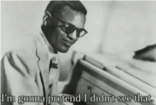 A black and white vintage photograph of a man in sunglasses and formal attire looking dismissively with text 'I'm gonna pretend I didn't see that.'