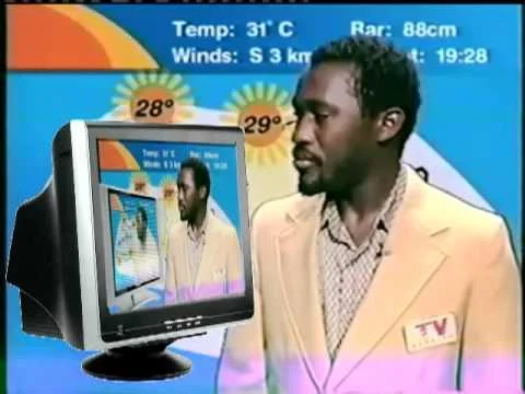 Pretty Much Everywhere Its Gonna Be Hot — A man in a beige blazer presents weather with a TV monitor and graphics showing temperature readings of 31°C, 28°