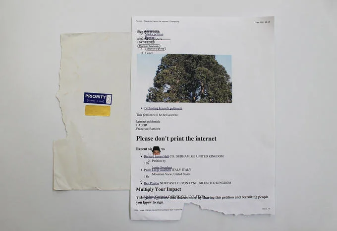 Printing Out the Internet — Printed copy of the Change.org petition Please Don't Print the Internet next to a mailing envelope