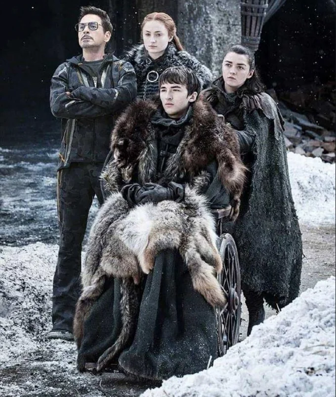Protect The Starks — Full portrait of Tony Stark edited into a photo with Sansa, Bran in a wheelchair, and Arya Stark