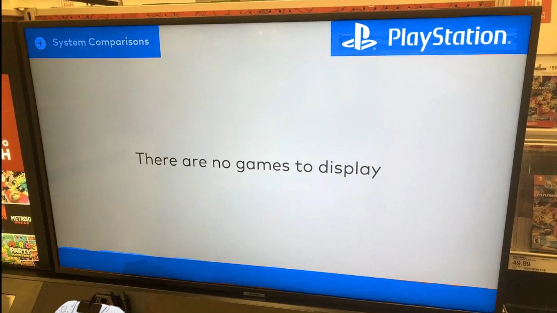 PS5 Has No Games — PlayStation kiosk screen reading 'There are no games to display' in a store aisle