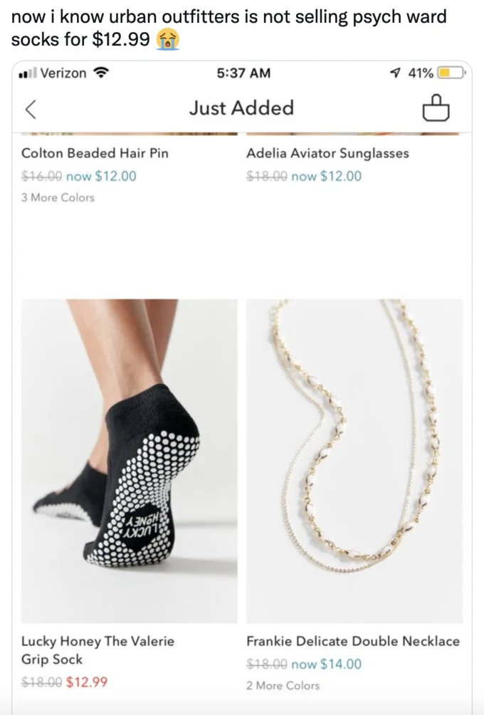 Tweet showing Urban Outfitters selling a black grippy sock resembling psych ward socks for $12.99.