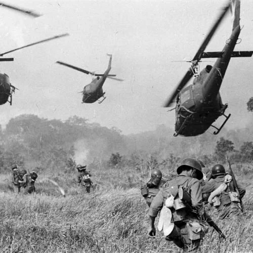 Ptsd Chihuahua — Black and white photo of Vietnam War soldiers and helicopters in a field.
