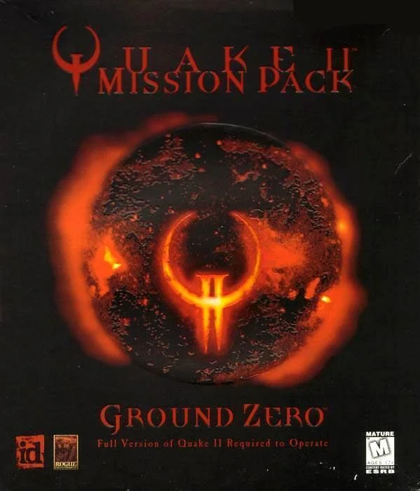 Box art for Quake II Mission Pack: Ground Zero featuring a fiery orange logo