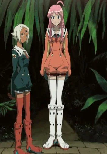Quality — Two anime girls standing outdoors where the pink-haired character on the right has dramatically elongated legs accounting for most of her height in