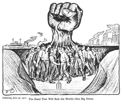 Raised Fist — A black-and-white pen-and-ink illustration from June 30, 1917, showing a giant clenched fist rising above a crowd of workers marching with tools