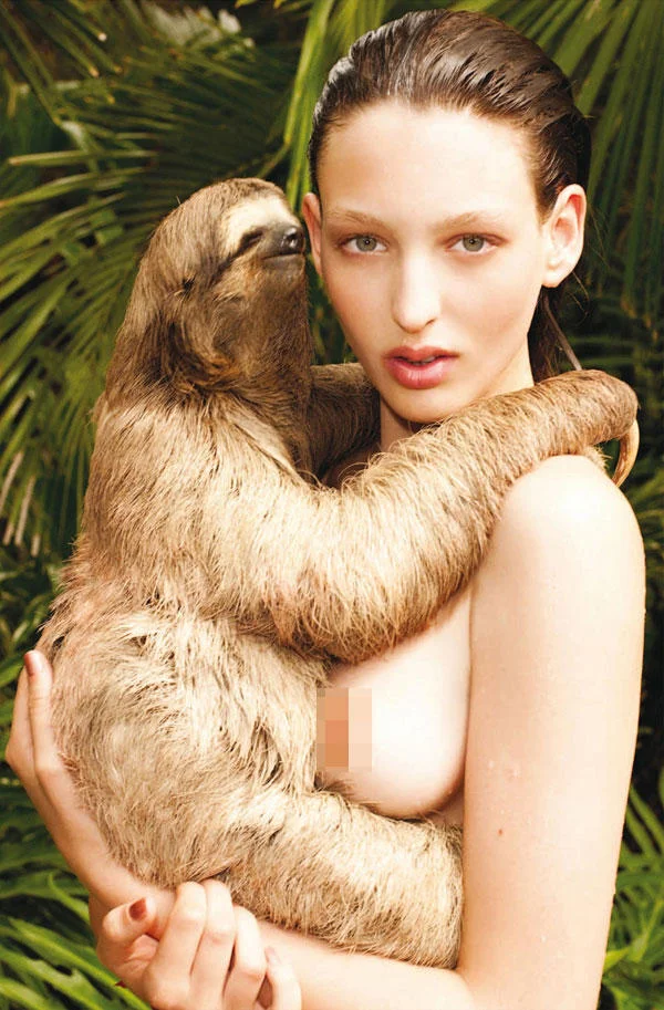 Rape Sloth — Model holding a three-toed sloth in a jungle, with censor bar, source photo for the meme