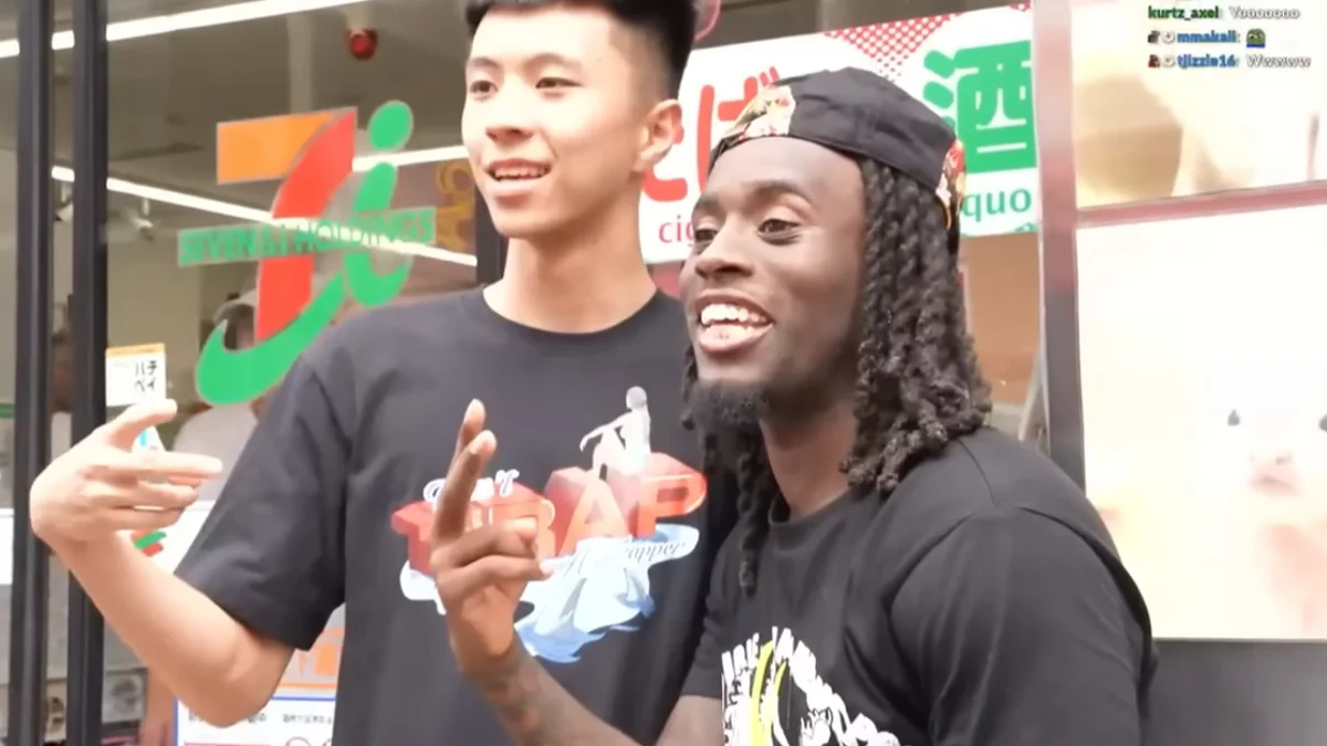 Ray and Kai Cenat posing together during a livestream outside a Japanese convenience store