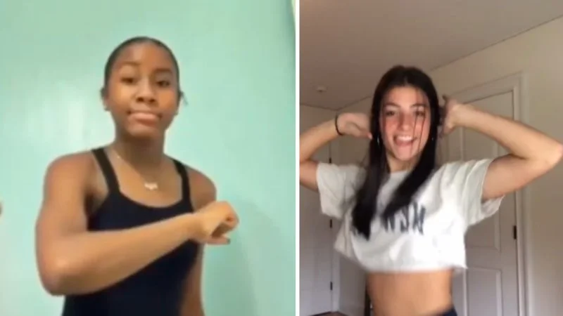 Split-screen comparison of two dancers performing the signature Renegade dance moves with recognizable arm movements and body choreography.
