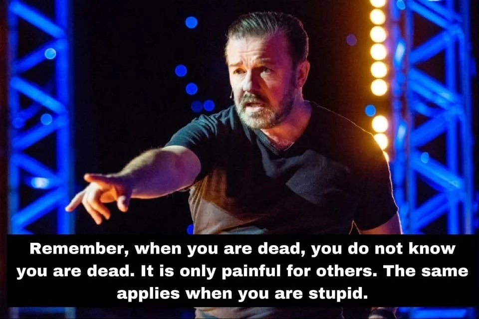 Ricky Gervais on stage pointing, captioned with his 'when you are dead' stupidity quote.
