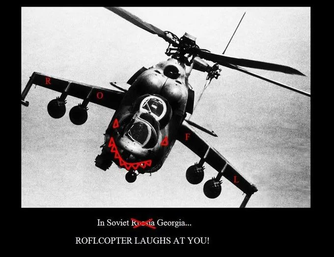A dramatic black-and-white photo of Soviet Mi-24 Hind attack helicopter with red 'R O F L' letters and laughing face superimposed on cockpit with caption 'In