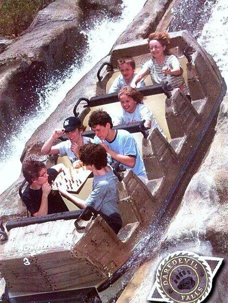 Roller Coaster Chess — Group of riders playing chess in a Daredevil Falls log flume boat