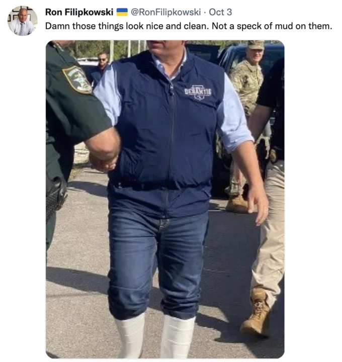 Ron DeSantis' White Boots — Twitter screenshot from Ron Filipkowski highlighting DeSantis's clean white rubber boots.