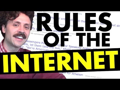 Man with large emphasis text 'RULES OF THE INTERNET' in white letters with yellow highlight effect and printed reference material background.