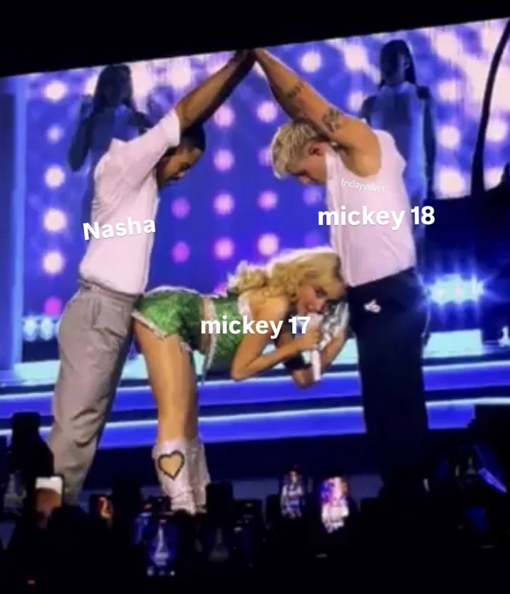 Sabrina Carpenter Eiffel Tower Pose — An exploitable meme version of Eiffel Tower pose with white text labels: 'Nashe' left, 'mickey18' right, 'mickey17'
