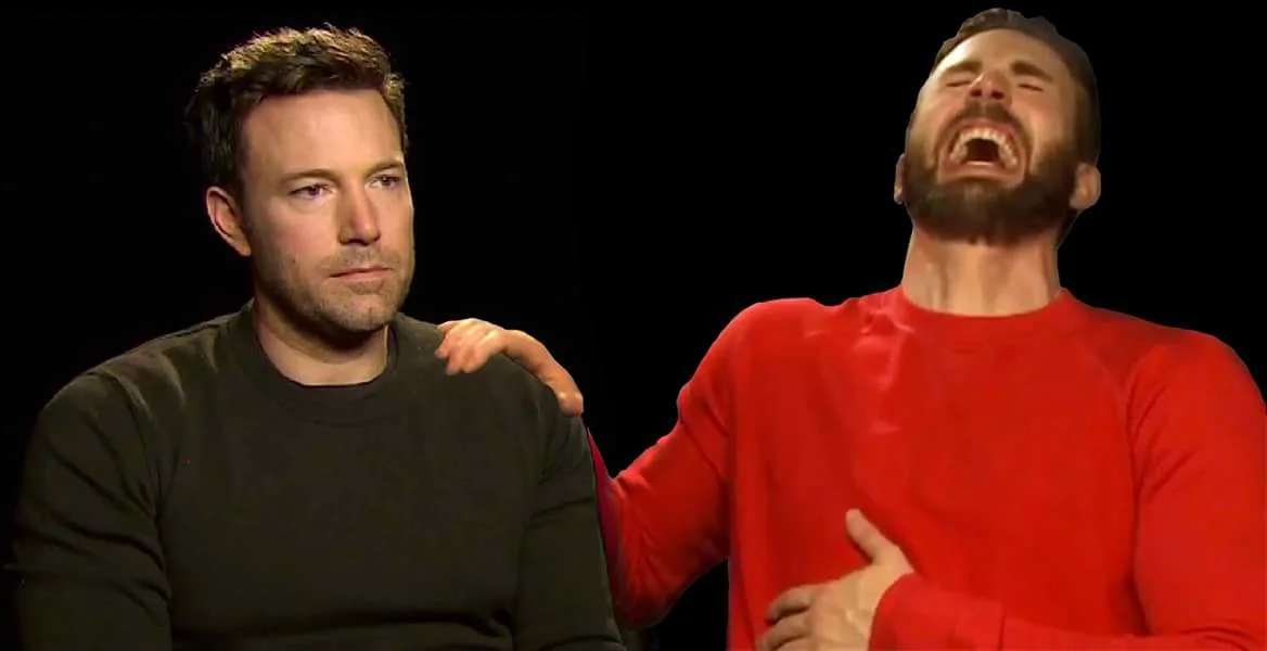 Sad Affleck — Sad Ben Affleck seated next to laughing Chris Evans in a red sweater