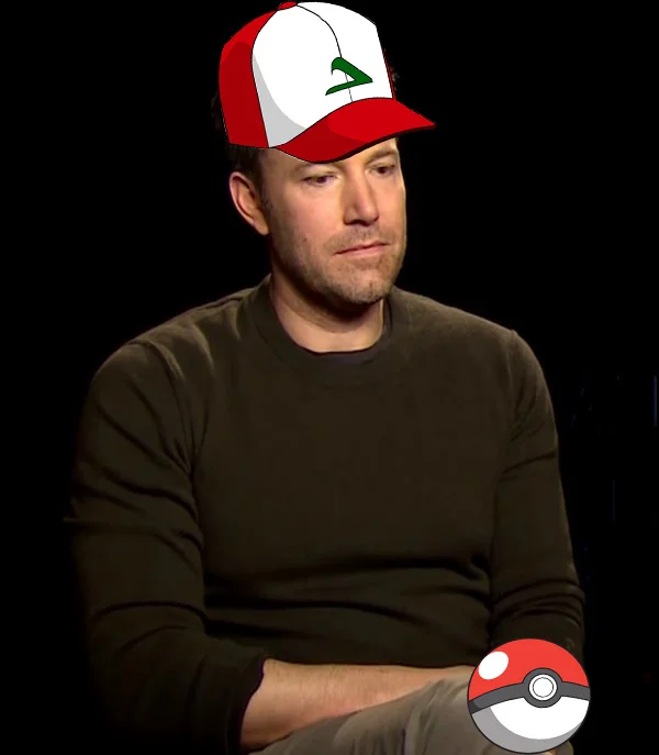 Sad Affleck wearing Ash Ketchum's Pokémon trainer hat holding a Poké Ball